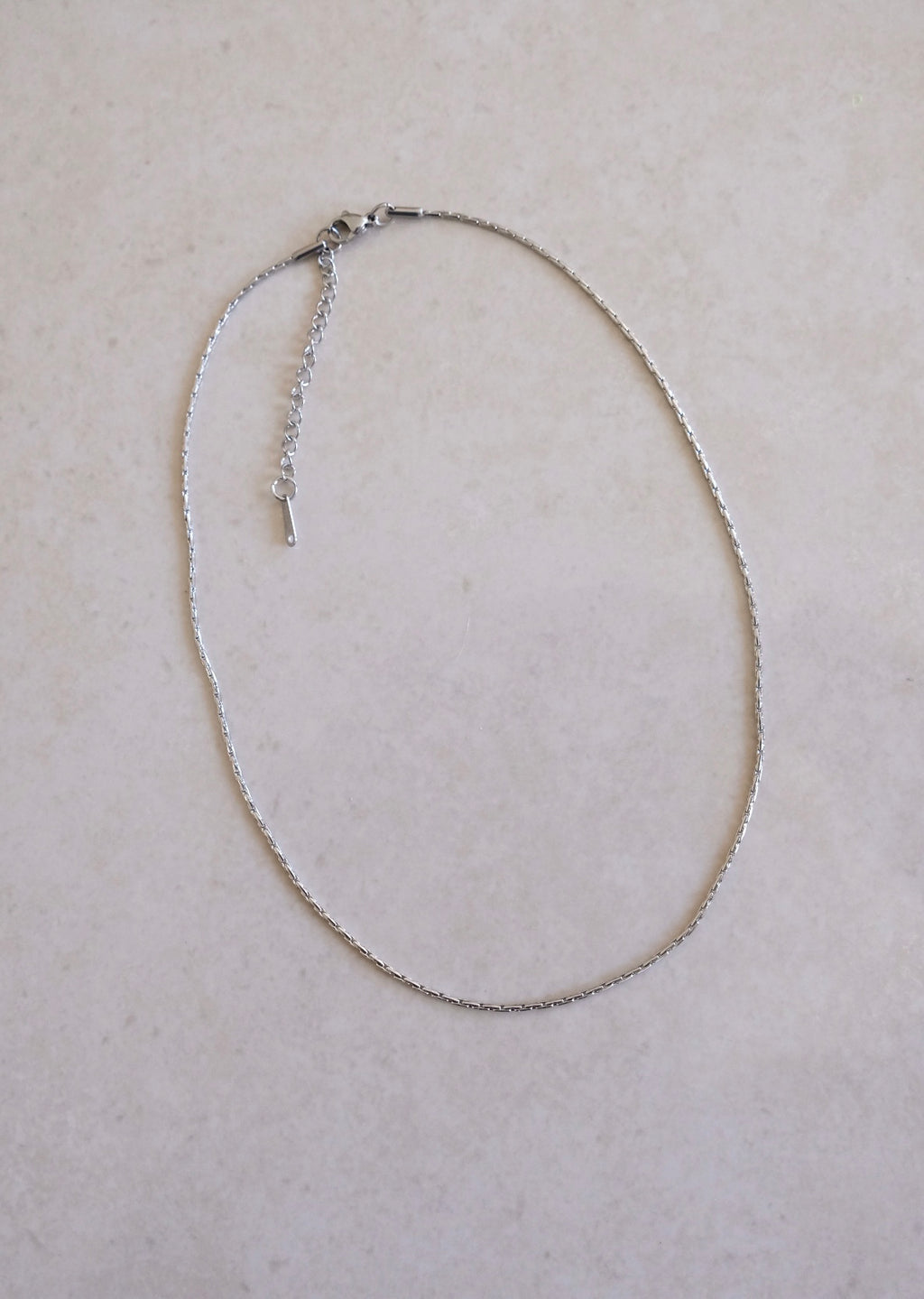 Base catenina filo argento