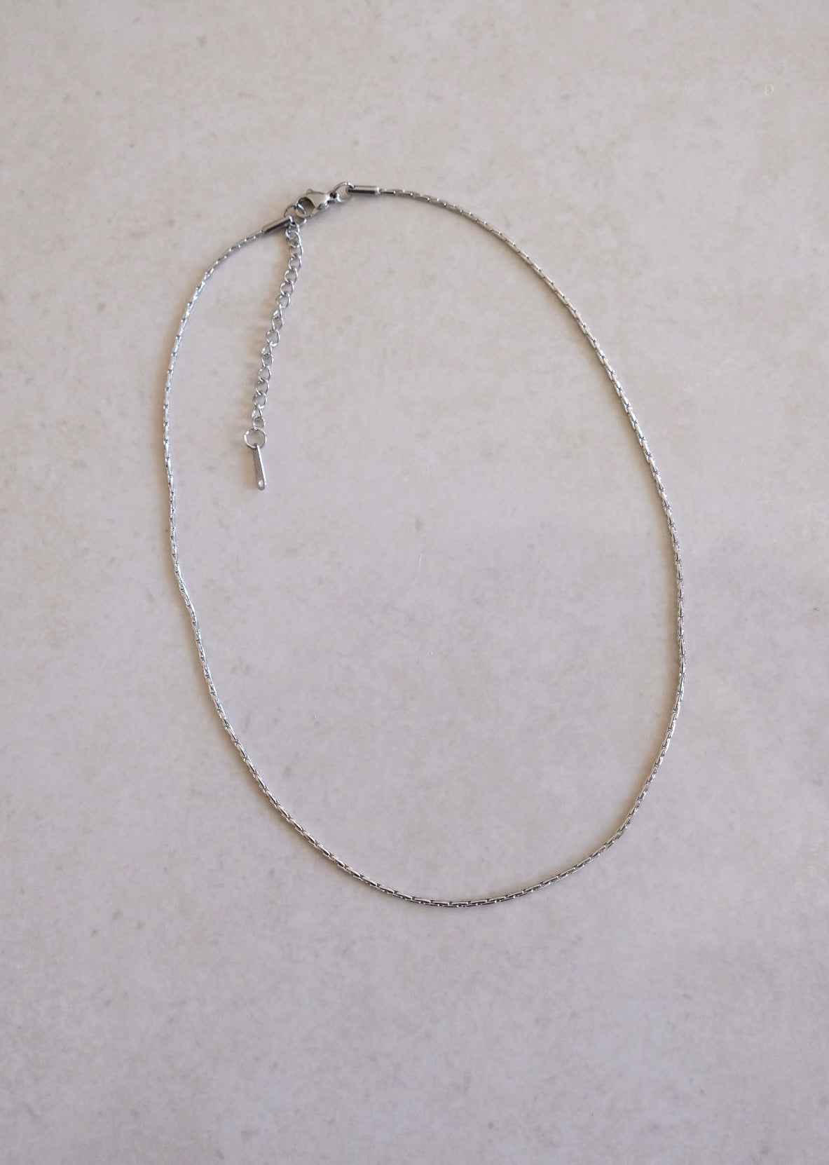 Base catenina filo argento