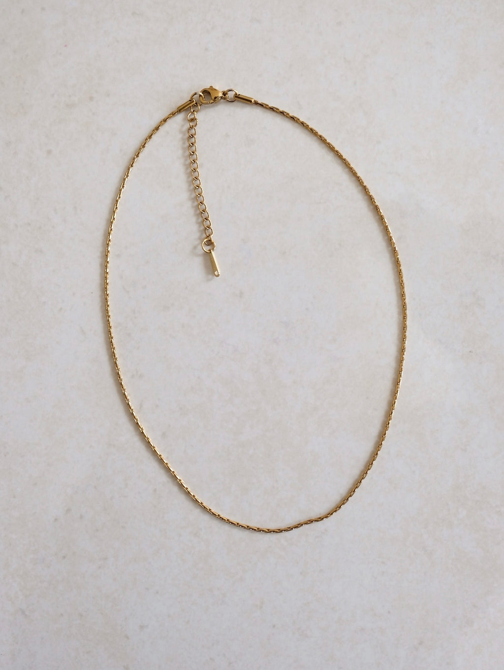 Base catenina filo oro
