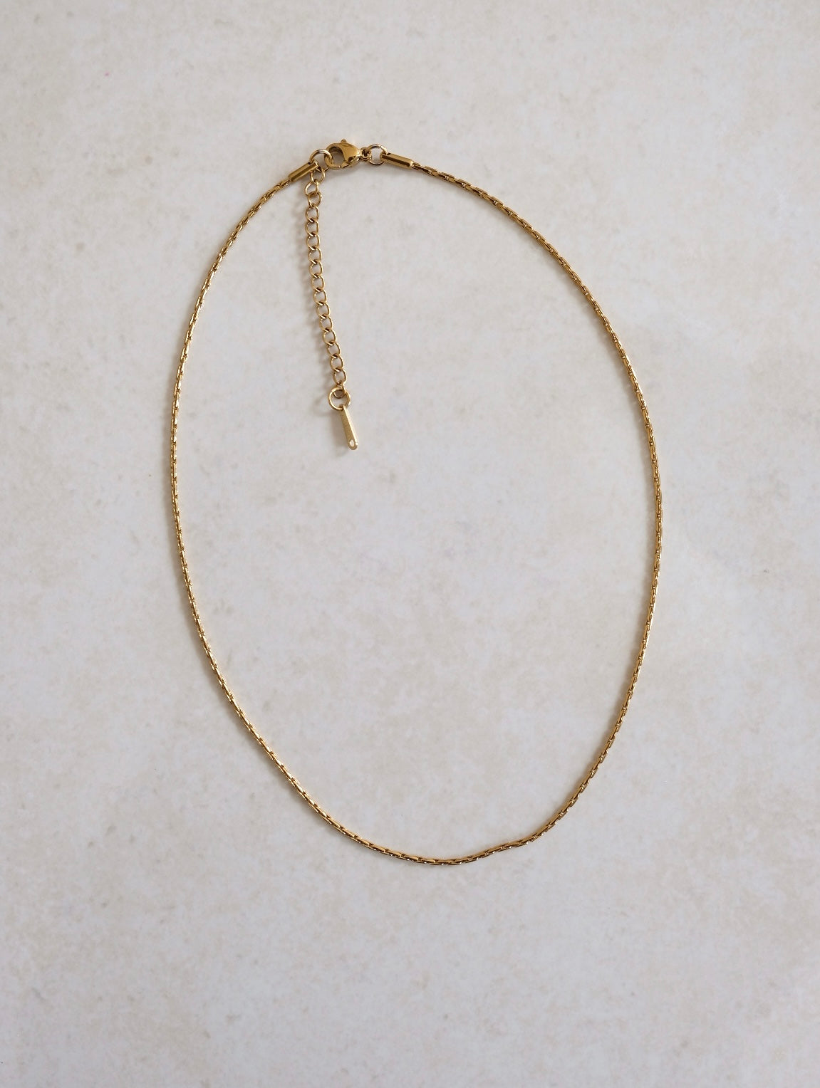 Base catenina filo oro
